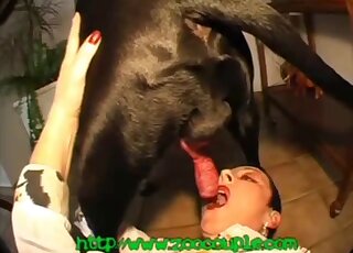 Short-haired mature broad stuffs her mouth with giant canine dick