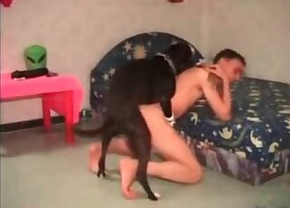 Black dog gladly bangs zoophile's ass hole during homemade zoo porn