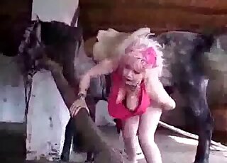 XXX zoo porn with a busty mature slut that enjoys sex with a horse