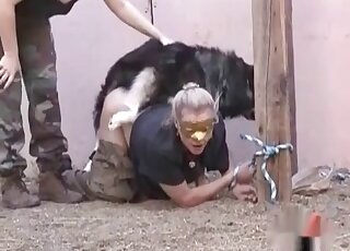 Masked mature takes off pants to get her snatch banged by a dog