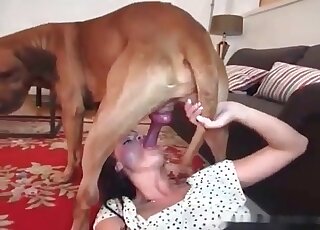Mature hottie goes for her dog’s pink cock and enjoys it to the fullest