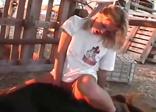 Animal porn movie showing farmer MILF blonde that rides dick
